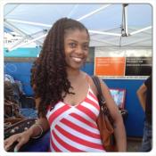 At the African Heritage Bazaar 2013: Posing off with my curly dreadlocks after I took the pipe cleaners out.