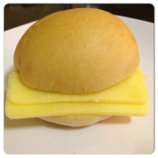 Bajan cheese cutter on freshly baked homemade Bajan salt bread with Anchor New Zealand Cheddar Cheese.