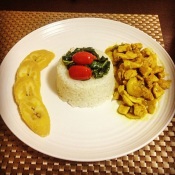 My home-cooked curry chicked with Jasmine rice and sweet steamed plantains.